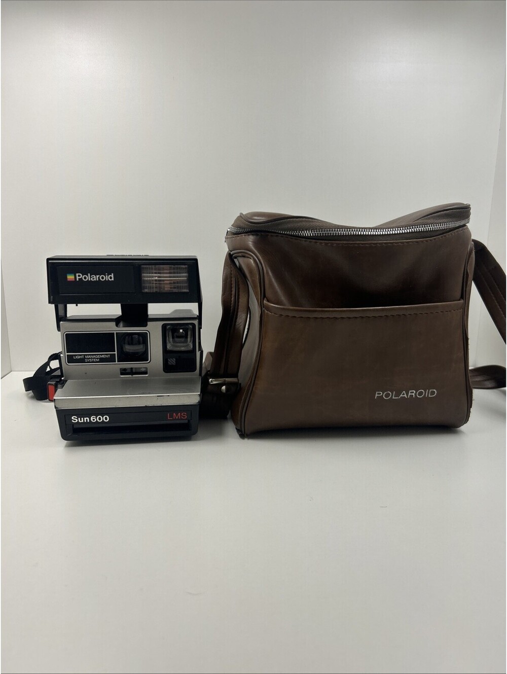 Polaroid Sun 600 LMS Vintage Instant Film Camera Black *UNTESTED* W/Bag